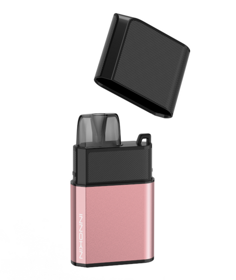 A compact, rectangular pink vape device with a black mouthpiece and a removable black cap lifted above it. The word "NIHONNI" is written vertically on the side of the Innokin Klypse Zip Kit. Featuring a 650mAh battery ideal for MTL vaping, the cap appears textured, contrasting with the smooth body.