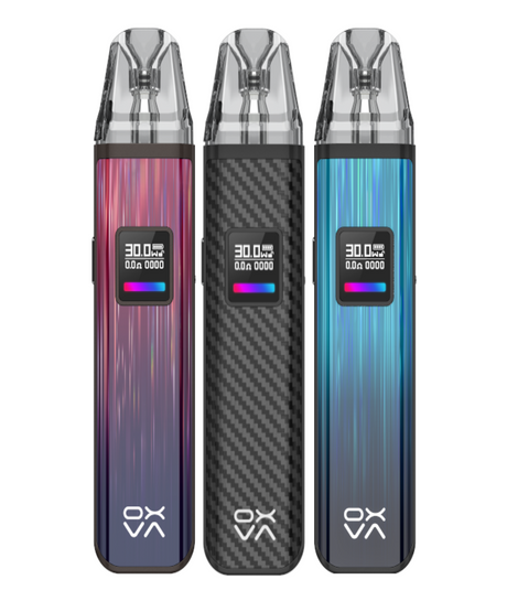 Three Oxva Xlim Pro Pod Kit devices lined up, each with a different body color gradient: pink, black, and blue. All feature digital displays, adjustable airflow, and carbon fiber patterns.